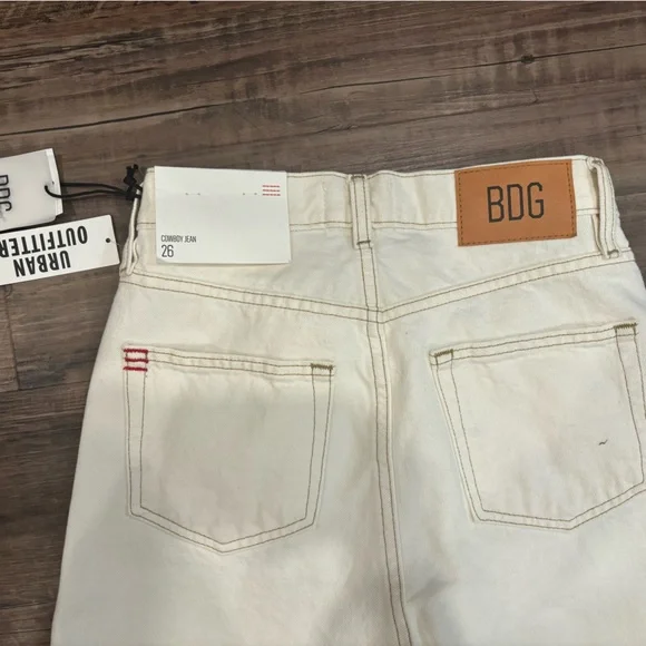 White BDG denim jeans from urban outfitters. New with tags size 26. Color: ivory - Picture 2 of 3